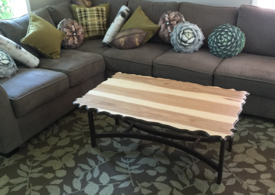MC2 Design - Custom Design: Custom sculpted and formed wood coffee table with a welded base